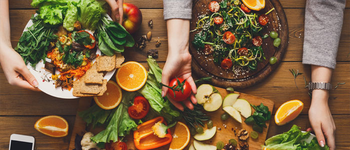 a table covered in health food and snacks